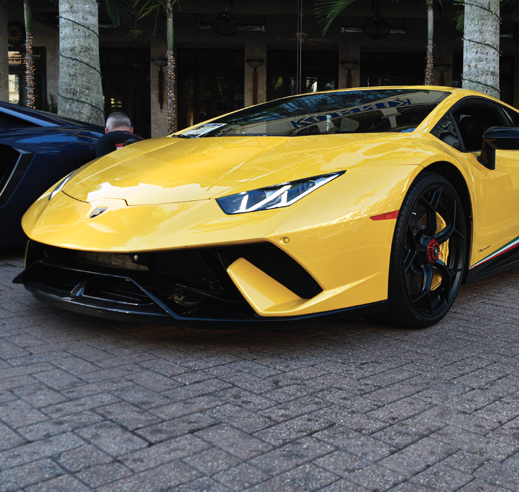 Lamborghinis line the streets of Fifth Avenue South Naples