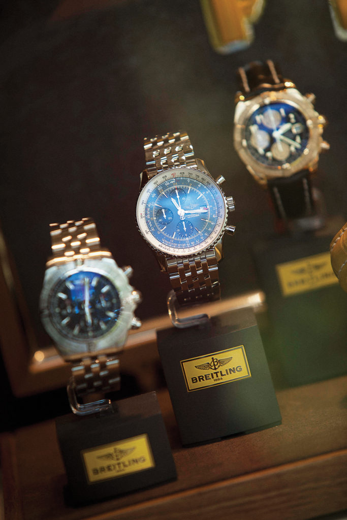 Men's watches on display in store display along 5th avenue south in Naples