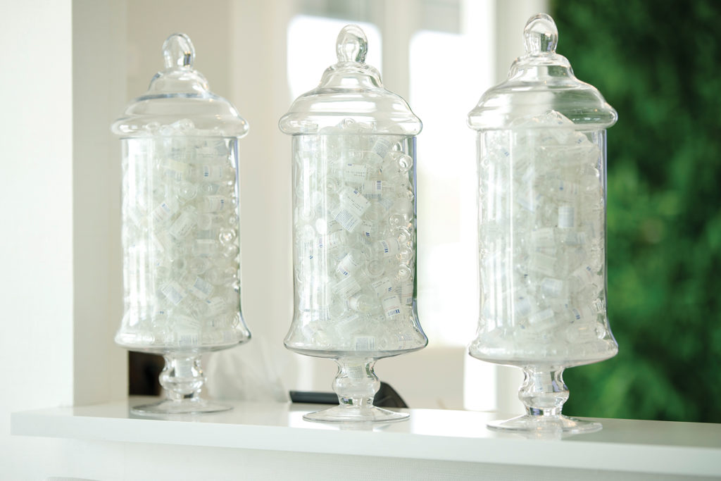 Glass jars at cosmetic procedure office