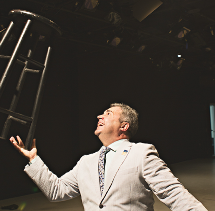 Florida Rep’s artistic director Greg Longenhagen balances a stool on his fingers