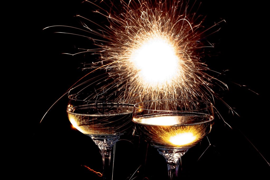 champagne glasses and sparkler