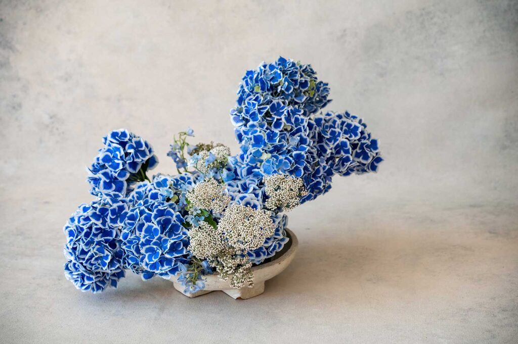 Blue Hydrangeas arrangement by Kaleidoscope Floral