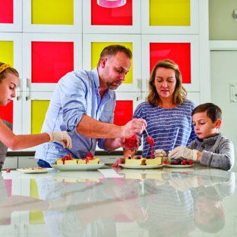 Chef Adam Nardis and his wife, Erin, with two of their kids